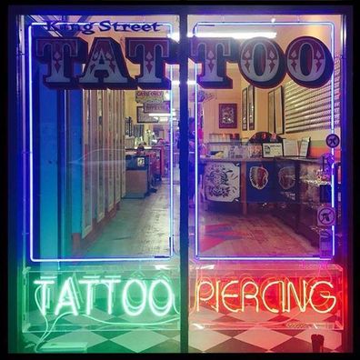 Sydney tattoo parlour condemned after employee's 'up-skirting' incident resurfaces