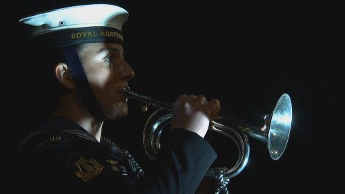 A Navy seaman plays The Last Post at The Cenotaph in Sydney on Anzac Day in 2023.
