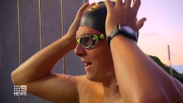 Sydney man breaks swimming record at Bondi Beach for mental health fundraiser
