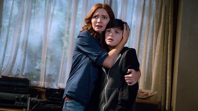 Logan Williams stars with Brigid Brannagh on The Flash.