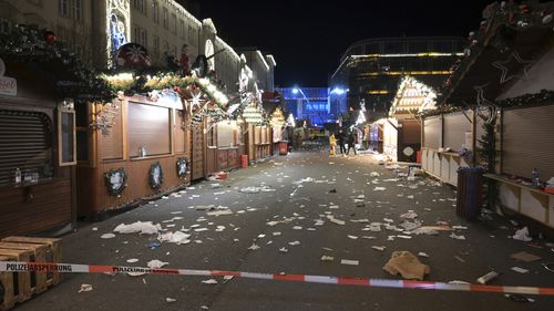 A view of the cordoned-off Christmas market after an incident in Magdeburg, Germany, Friday Dec. 20, 2024. (Heiko Rebsch/dpa via AP)