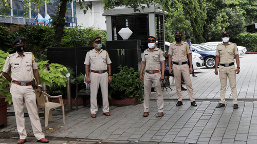 Indian policemen guard outside Chinese consulate anticipating protests in Mumbai, India, Wednesday, June 17, 2020. 