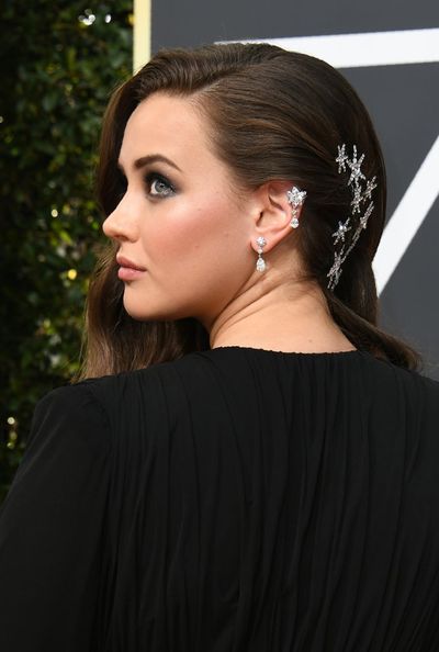 <em>13 Reasons Why</em> actress Katherine Langford stunned in a throwback to the 90's with star-embellished hair clips holding back her long waves. We have a feeling we'll be seeing a lot more of this look.