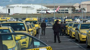 Taxis line up outside Melbourne Airport.