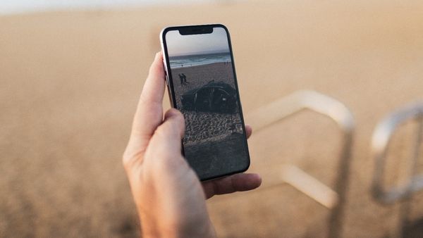 Person holding a smartphone in their hand 