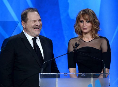 Producer Harvey Weinstein and Jennifer Lawrence speak onstage during the 24th Annual GLAAD Media Awards, in 2013.