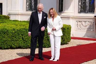 King Charles III talks with Italian Prime Minister Giorgia Meloni