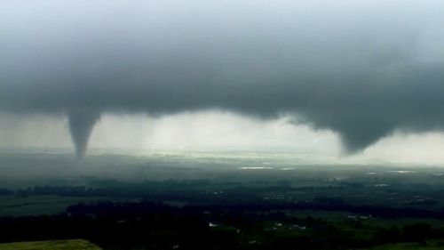 Funnel clouds over Crescent, Oklahoma.