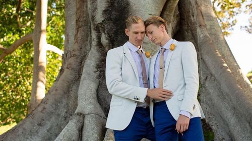 The pair became 'husband and husband' in front of their 50 closest family and friends. (9NEWS)