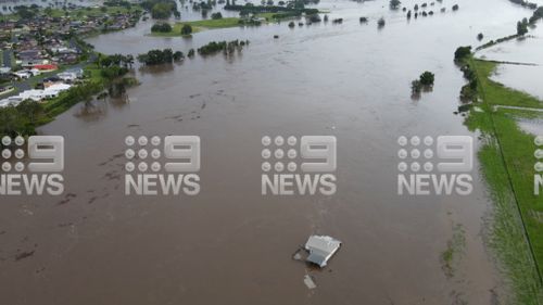House floats off in Taree, NSW flood.