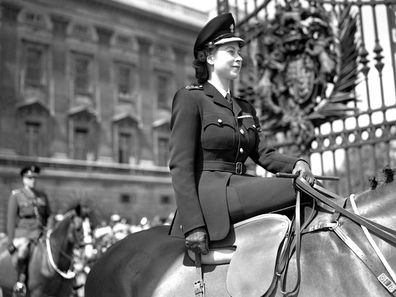 Princess Elizabeth attends 1947's Trooping the Colour on Horse Guards Parade in honour of the King's birthday for the first time.   (Photo by PA Images via Getty Images)