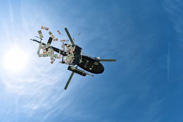 The Summit 2024 Helicopter drops $1 million