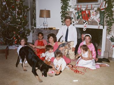 Jackie Kennedy, Lee Radziwill and their families have Christmas at the White House, 1962.