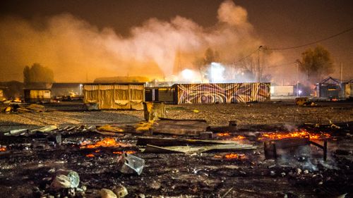 Fierce blaze destroys France's Grande-Synthe migrant camp
