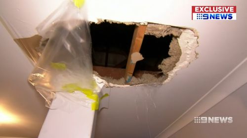 An alleged home invader fell through a Perth family's roof before locking himself in a bedroom.