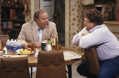 Ned Beatty and John Goodman on the set of Roseanne in 1989.