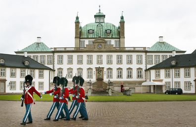 Guards march in the courtyard of Fredensborg Castle after a press conference held by Mary Elizabeth Donaldson and His Royal Highness Crown Prince Frederik of Denmark October 8, 2003 in Copenhagen, Denmark. 