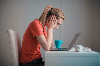 Upset woman at work