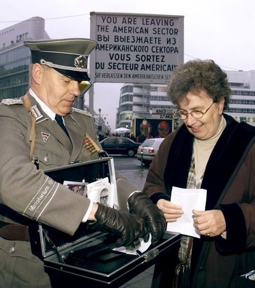 at former Checkpoint Charlie in Berlin Nov. 9, 1999, the 10th anniversary of the fall of the Berlin Wall.