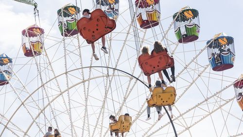 People enjoy the ferris wheel on Good Friday in 2021 at the Sydney Royal Easter Show.