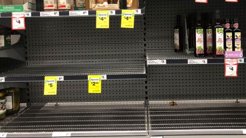 Townsville residents have experienced shortages in shops but retailers say extra supplies are heading to affected areas.