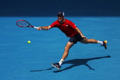 Tommy Paul of the United States plays a forehand in their round three singles match against Miomir Kecmanovic of Serbia during the 2024 Australian Open at Melbourne Park on January 20, 2024 in Melbourne, Australia. (Photo by Julian Finney/Getty Images)