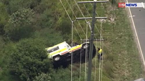 An ambulance also overturned en route to the fatal crash. (9NEWS)