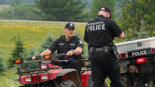US police converge on small town after escaped killers spotted in area