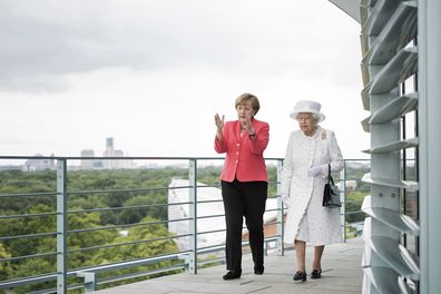 Angela Merkel welcomes Queen Elizabeth II upon her arrival at the Federal Chancellery on the second of the royal couple's four-day visit to Germany on June 24, 2015 in Berlin, Germany in this photo provided by the German Government Press Office (BPA)