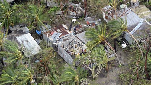 A damaged house near the Queensland town of Forrest Beach after Cyclone Yasi devastated northern parts of the state in 2011. 