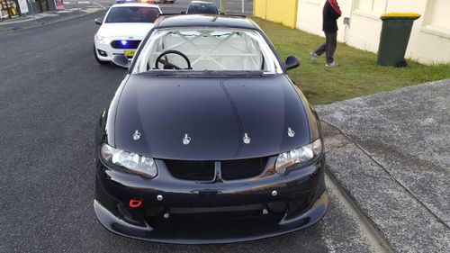 NSW traffic police today stopped this modified Holden Commodore at Gosford on the Central Coast because they noticed it did not have a windscreen. Picture: Supplied.