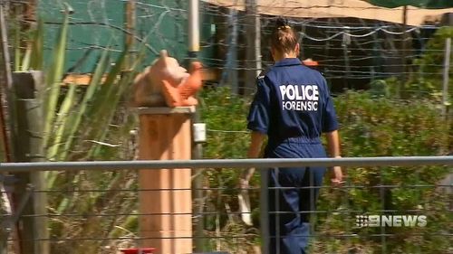 Forensic officers spent the day at the home. (9NEWS)