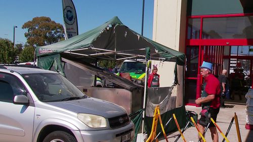 Couple rushed to hospital after barbecue catches alight at Adelaide Bunnings - 9News