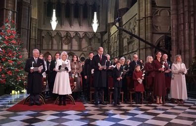 LONDON, ENGLAND - DECEMBER 15: (Front row left to right) King Charles III, Camilla, Queen Consort, Prince William, Prince of Wales, Prince George, Princess Charlotte, Catherine, Princess of Wales and Sophie, Countess of Wessex during the 'Together at Christmas' Carol Service at Westminster Abbey on December 15, 2022 in London, England. 