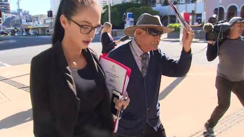 Sami Gindi leaves court with his lawyer. Picture: 9NEWS