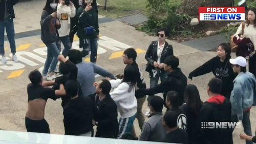 The brawl broke out between fans of Chinese band Nine Percent and a media crew.