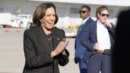 Democratic presidential nominee Vice President Kamala Harris walks to Air Force Two as she departs from Gerald R. Ford International Airport in Grand Rapids, Mich., Friday, Oct. 18, 2024, en route to Lansing, Mich. (AP Photo/Jacquelyn Martin, Pool)