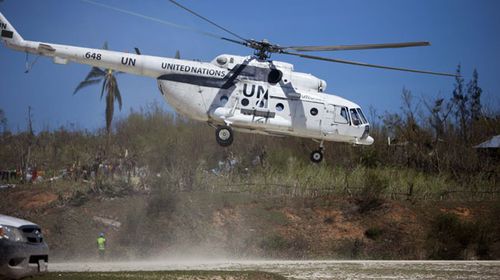 UN aid arrives by helicopter in southwest Haiti, after Hurricane Matthew left over 800 dead and thousands without homes. (AP)