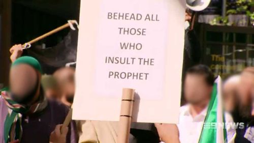 One of the accused allegedly held a sign reading: "behead all those who insult the prophet" during a protest at Sydney's Hyde Park in 2012.