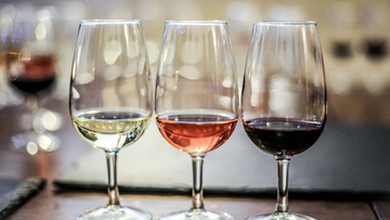 Wine tasting: glasses of white, rose and red wine
