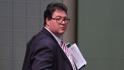 Nationals MP George Christensen crosses the floor on penalty rates
