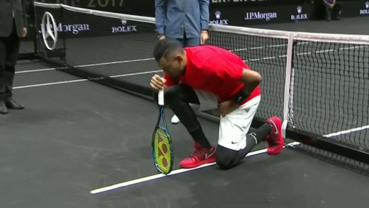 Kyrgios takes knee before loss to Federer