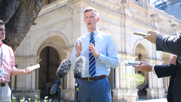 Queensland Transport Minister Mark Bailey speaks to media outside state parliament on Thursday, October 12, 2023.