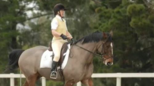 Ms Trease, a vet, is also a keen horse rider. (9NEWS)