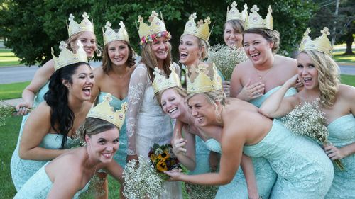 The bride and her bridesmaids in their Burger King crowns. (Getty)