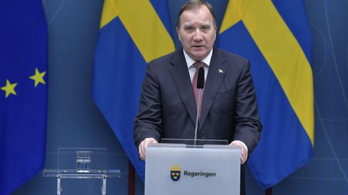 Sweden's Prime Minister Stefan Lofven speaks during a coronavirus news conference, in Stockholm, Friday, Dec. 18,2020