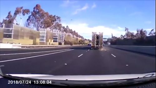 A large truck carrying logs appears in another lane ahead and Ms Butler switches lanes, placing her car directly behind it. Picture: Facebook/Kahla Euphemia Butler