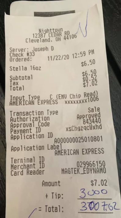 Restaurant receipt with $3000 tip