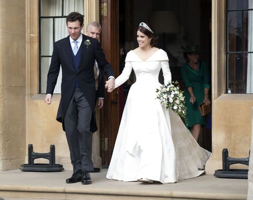 Mr and Mrs Jack Brooksbank leave Windsor Castle to attend a second reception after their weddding.