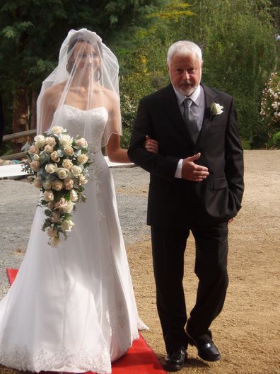 Chris walking his daughter down the isle